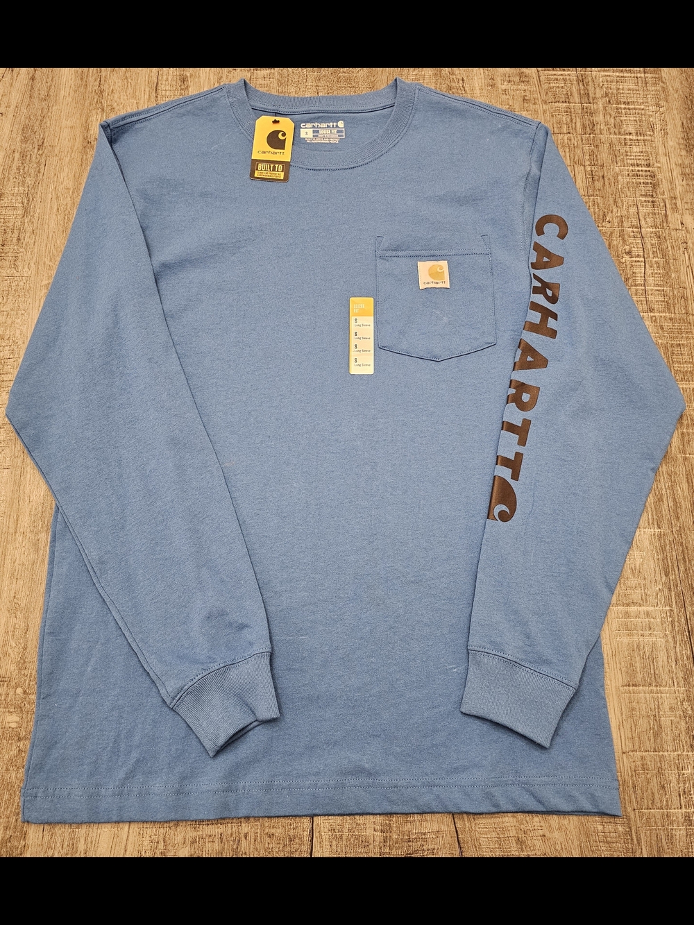Carhartt Men's Long Sleeve Pocket Tee in Dusty Blue with Sleeve Logo